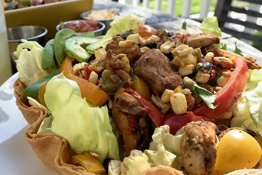 Date Night Crockpot Recipes Close Up of Fajita Chicken on a Taco Salad Bowl 