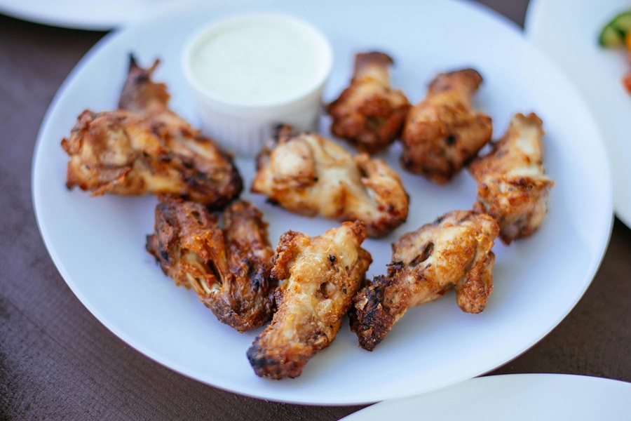 Instant Pot Frozen Chicken Recipes Close Up of a Plate of Cooked Chicken Wings