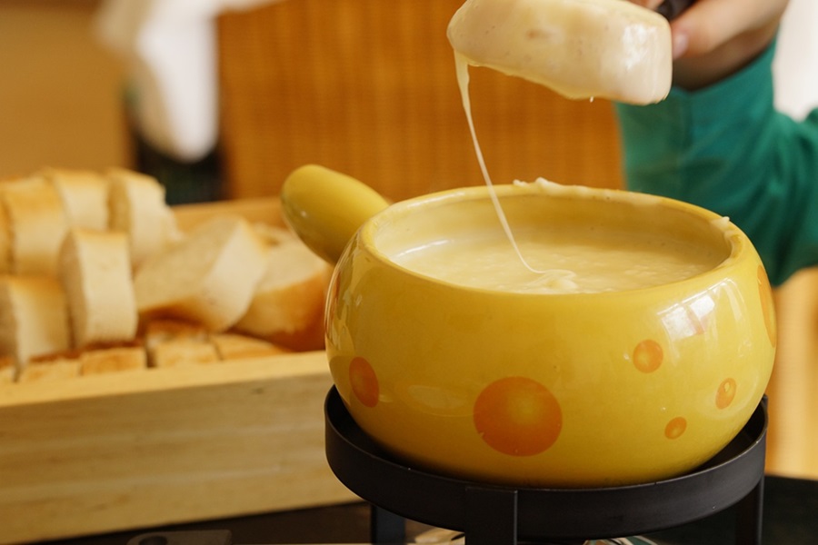 Queso Dip Crockpot Recipes Close Up of a Fondue Pot Filled with Cheese