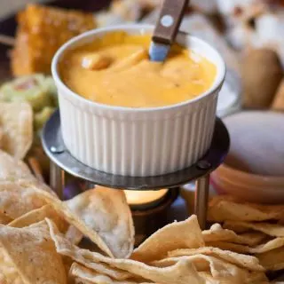 Queso Dip Crockpot Recipes Close Up of a Party Platter with Chips and a Queso Dip in the Middle