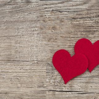 Valentines Day Dinner Instant Pot Recipes Close Up of Two Fabric Hearts on Wood