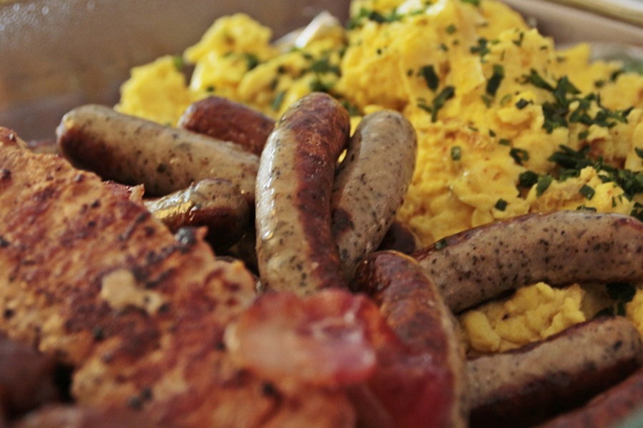 Slow Cooker Brunch Recipes Close Up of Potatoes, Sausage Links, and Scrambled Eggs