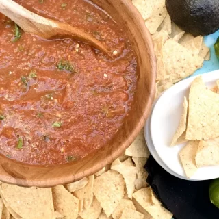 Super Bowl Appetizers Crockpot Recipes Close Up of a Bowl of Salsa with Tortilla Chips Surrounding It
