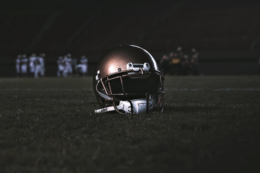 Super Bowl Appetizers a Football Helmet on a Grass Field