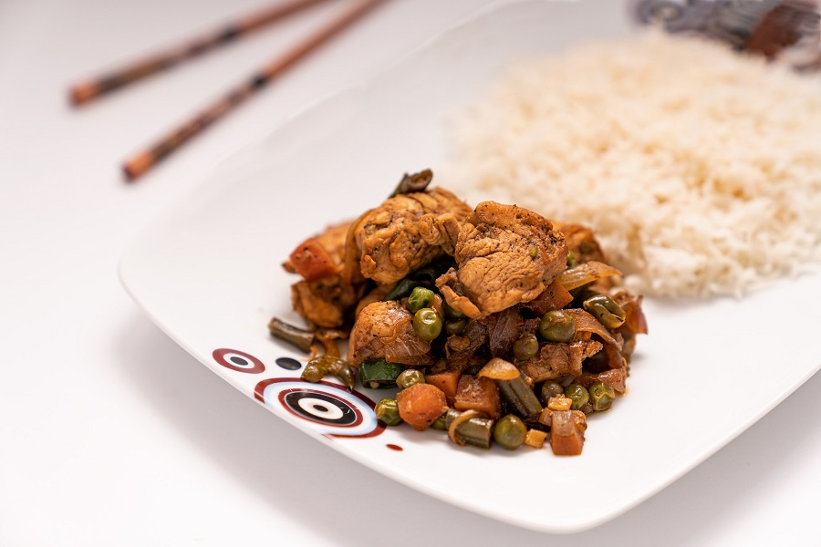 Instant Pot Chicken Thighs Recipes Close Up of Chicken and Rice Dinner on a Plate