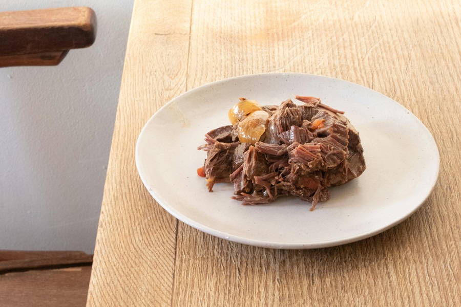 Instant Pot Whole30 Recipes with Beef a Serving of Pot Roast on a White Plate on a Wooden Table