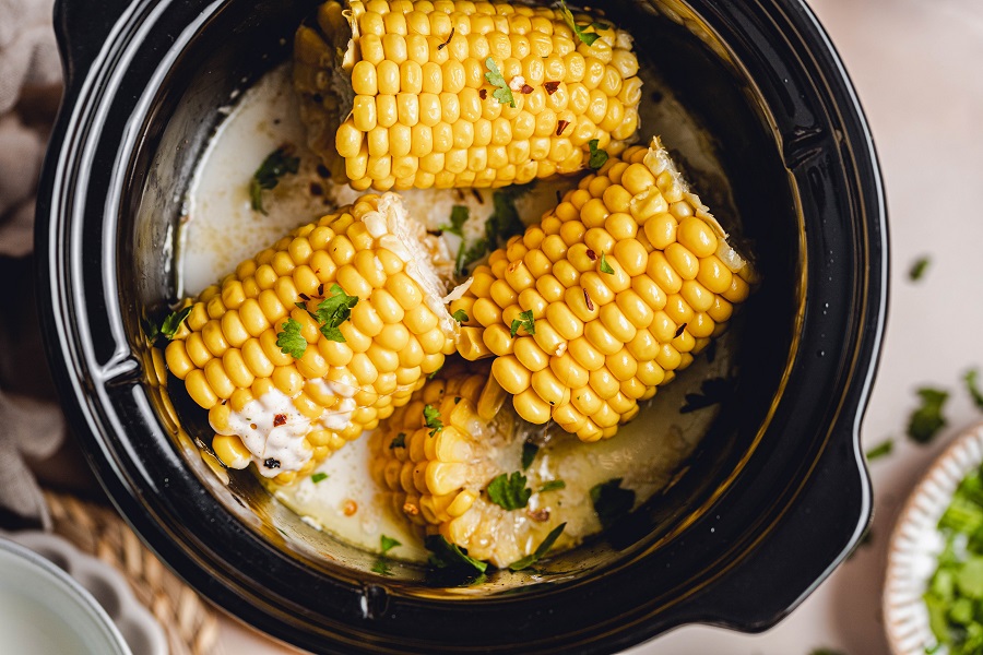Crockpot Corn on the Cob with Coconut Milk Recipe View of Cooked Cobs in a Crockpot