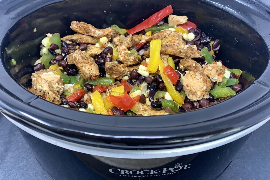 Funny Slow Cooker Quotes Overhead View of a Crockpot Filled with Fajita Chicken