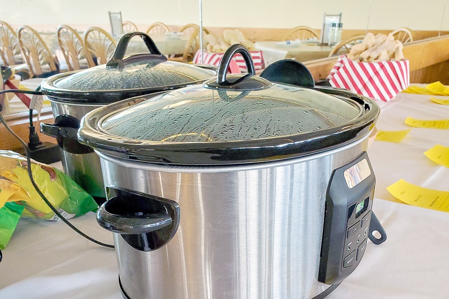 Crockpot Memes View of a Table of Crockpots at a Chili Cookoff