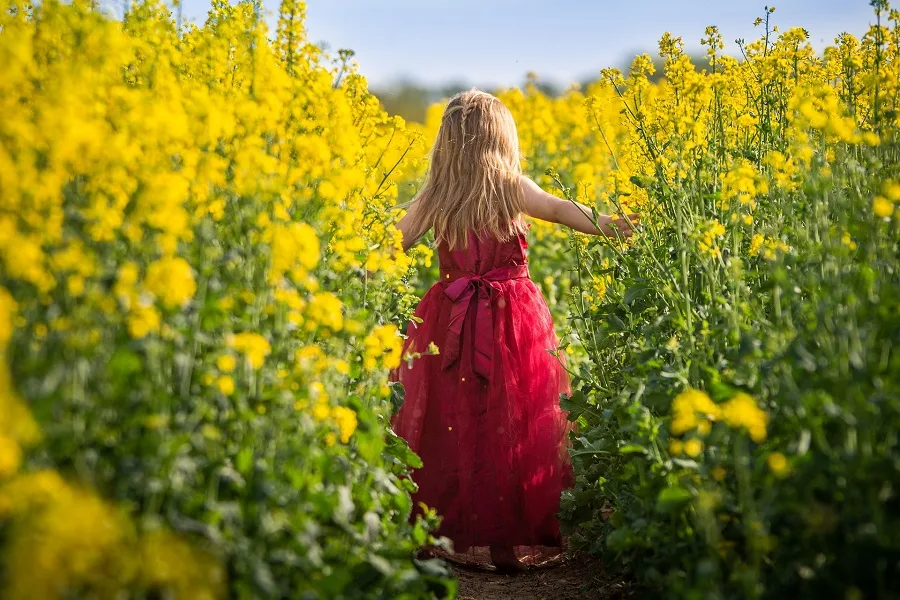 Instant Pot Spring Dinner Ideas Young Girl Running Through Flowers as Tall as Her