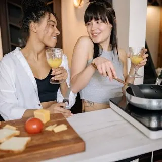 Funny Cooking Memes Two Women Cooking in a Kitchen While Drinking Wine