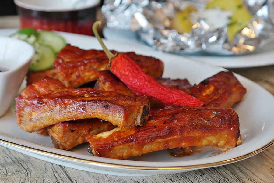 Best Crockpot BBQ Recipes a Plate of BBQ Ribs with a Pepper on Top