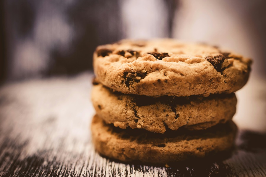 Best Crockpot Summer Dessert Recipes for a Crowd Close Up of a Stack of Chocolate Chip Cookies