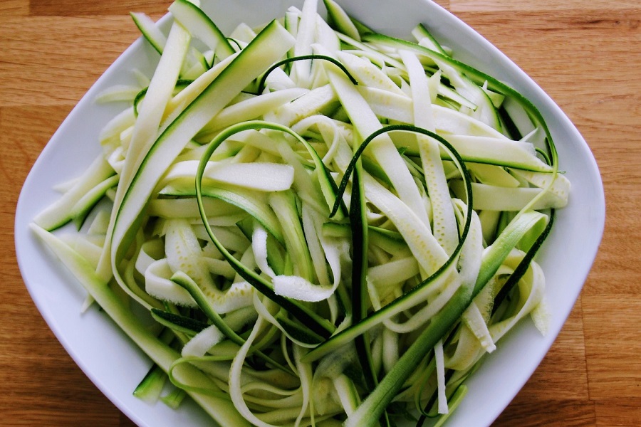 Best Crockpot Zucchini Recipes Overhead View of a Plate of Zucchini Noodles