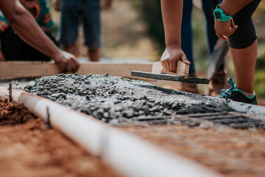 Labor Day Memes Close Up of Cement Being Poured and Smoothed 