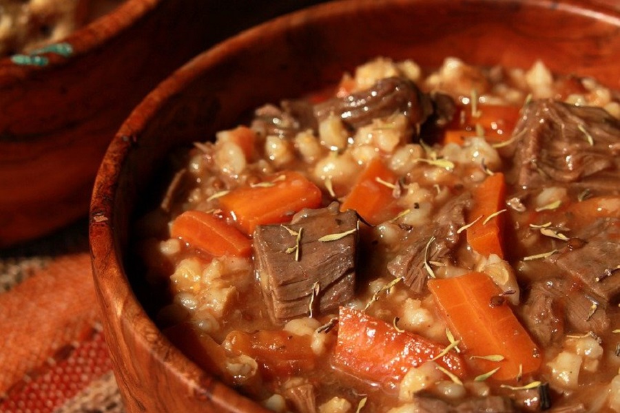 Crockpot Stews with Beef Close Up of a Wooden Bowl Filled with Stew