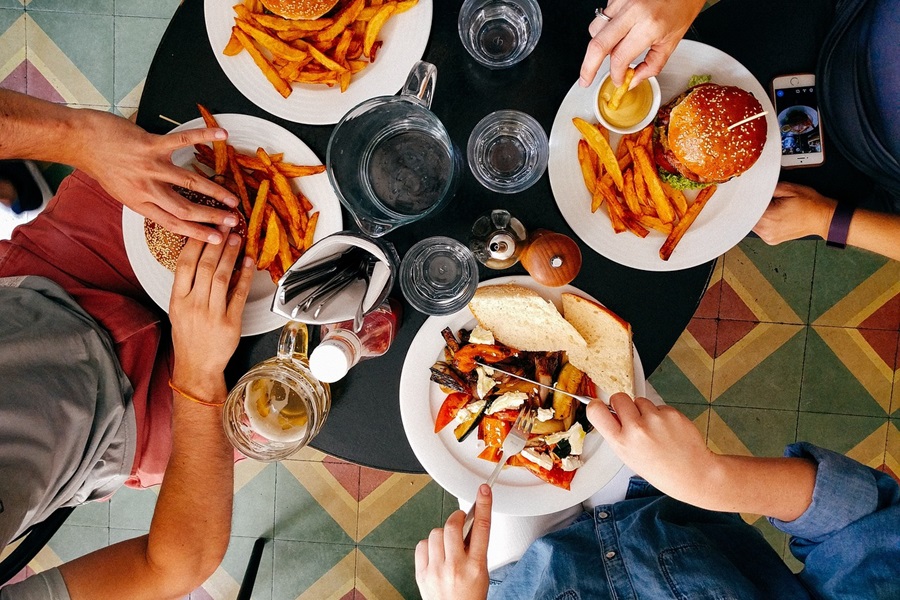 Funny Eating Memes Overhead View of a Table with People Eating Different Meals at it