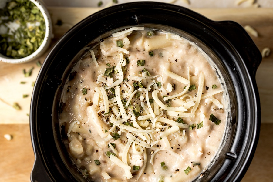 Easy Leftover Turkey and Noodles Recipe Overhead View of a Crockpot with a Casserole Cooking Inside