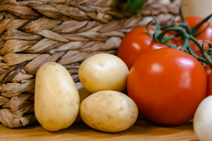 Hashbrown Hamburger Casserole Recipes Close Up of Potatoes and Tomatoes Next to a Woven Basket