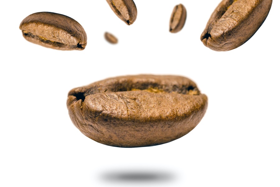 Best Coffee Bean Drinks Coffee Beans Falling Against a White Background