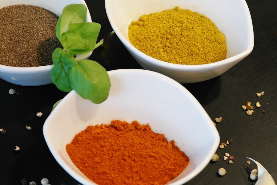 Chili Powder vs Cayenne Small White Bowls with Seasonings in Each