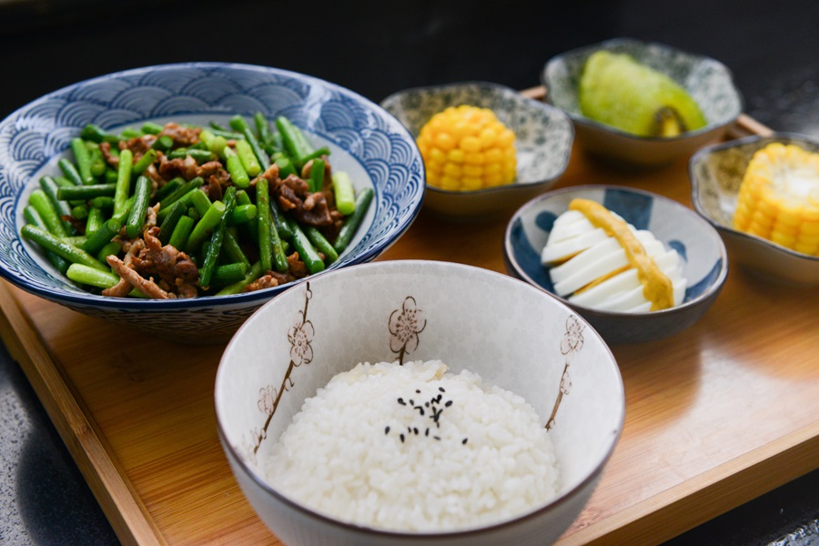 Instant Pot Rice Too Sticky a Table Set for Dinner with a Bowl of White Rice