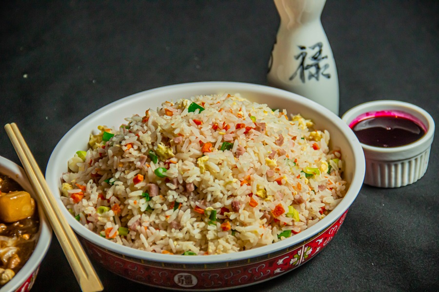 Instant Pot Rice Too Sticky a Bowl of Fried Rice with a Small Ramekin of Sauce Next to it