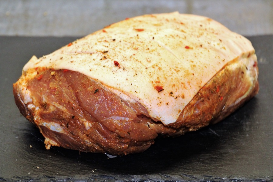 Can I Put a Frozen Pork Roast in the Crockpot Close Up of Raw Pork Seasoned