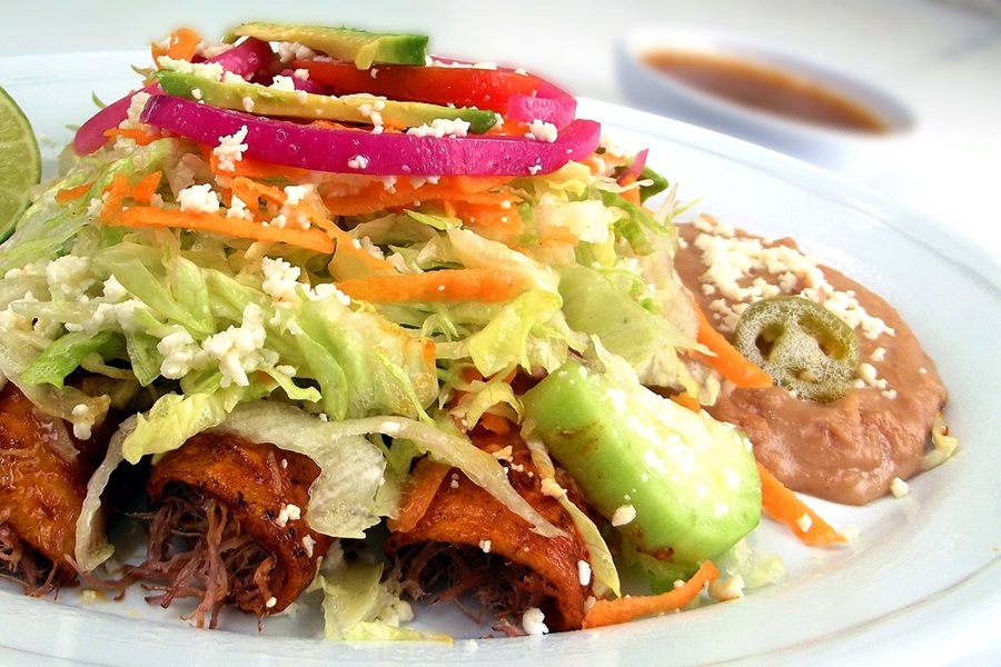 Mexican Barbacoa Recipe Ideas Close Up of Three Enchiladas on a Plate