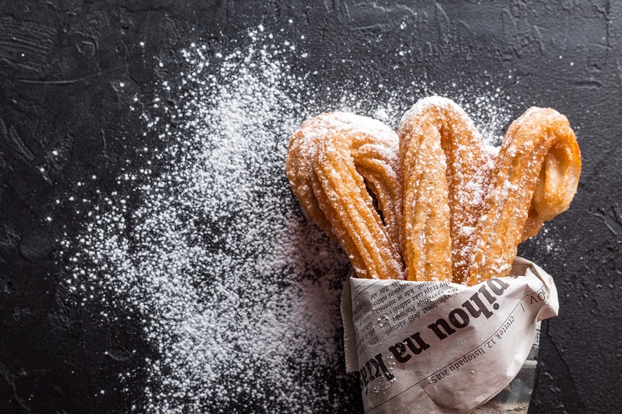 Easy and Cheap Air Fryer Recipes Close Up of Churros Dusted with Sugar