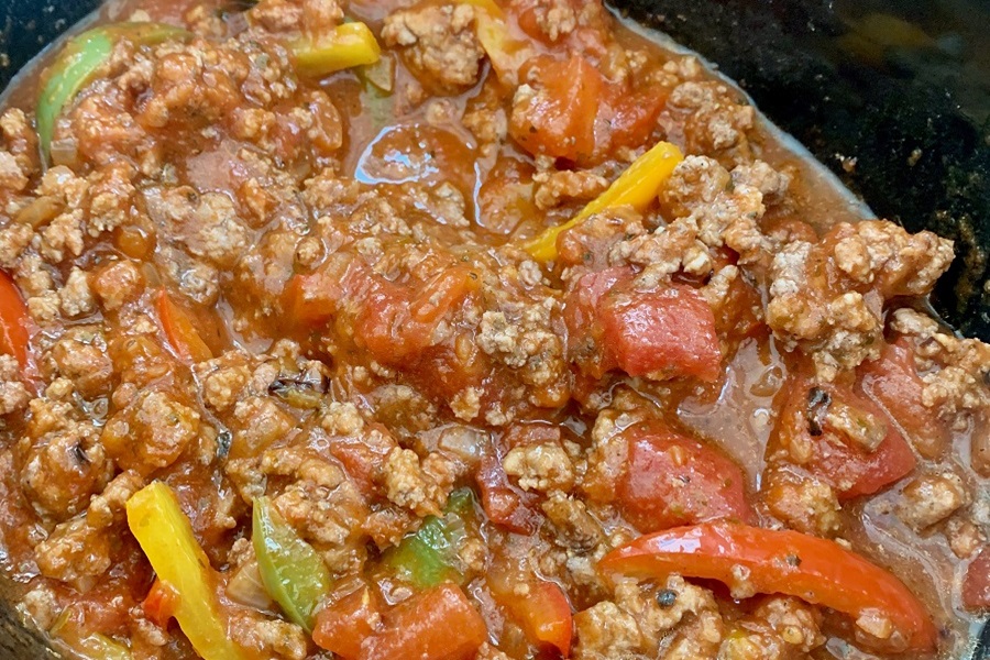 Leftover Hamburger Meat Recipes for Dinner Close Up of Ground Beef Chili in a Pot with Peppers and Tomatoes