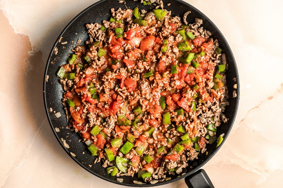 Leftover Hamburger Meat Recipes for Dinner Overhead of a Skillet Filled with Ground Beef and Tomato Sauce