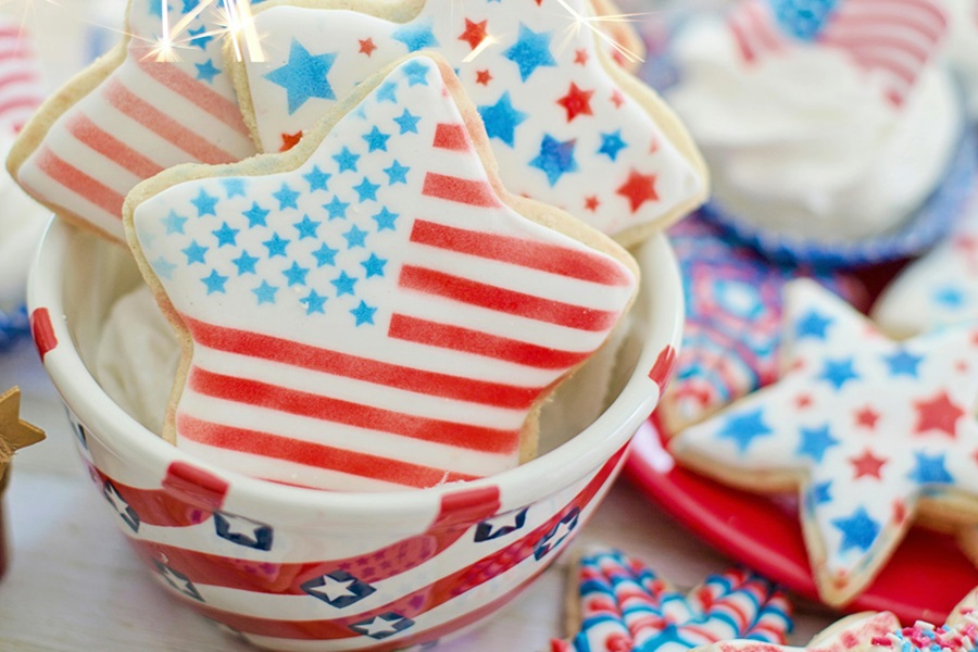 Easy Patriotic Food Appetizers for a Party Close Up of Sugar Cookies with American Flag Frosting