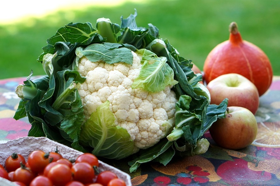 Instant Pot Cauliflower Recipes a Head of Cauliflower on a Table Outside