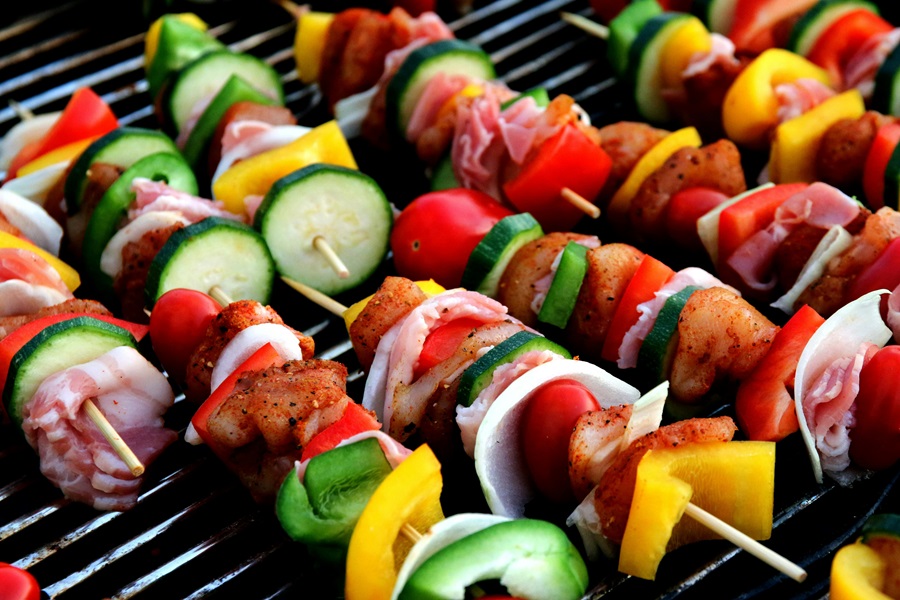 Summer Dinner Recipes for the Grill Close Up of Kebabs with Meat and Veggies on a Grill