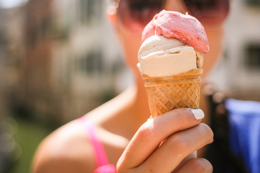 Super Easy Summer Dessert Recipes Close Up of a Cone of Ice Cream Being Held by a Person