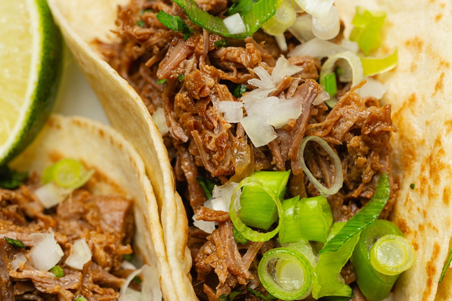 Close Up of Easy Crockpot Beef Barbacoa Tacos