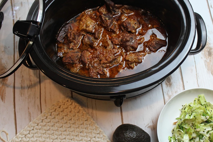 Easy Crockpot Beef Barbacoa Chuck Beef Chunks Cooking in a Crockpot