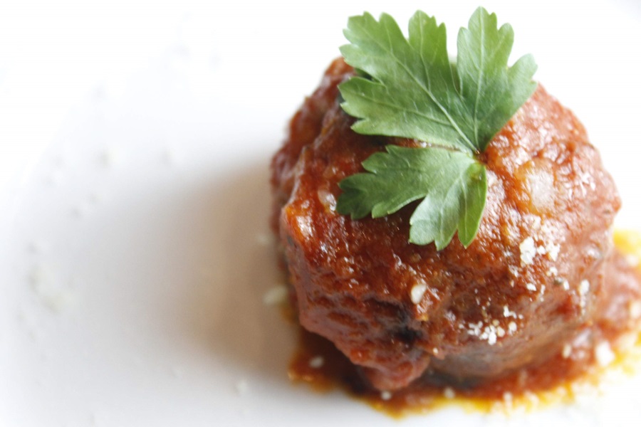 Easy Crockpot Meatballs Dinner Recipe Close Up of a Meatball on a Plate