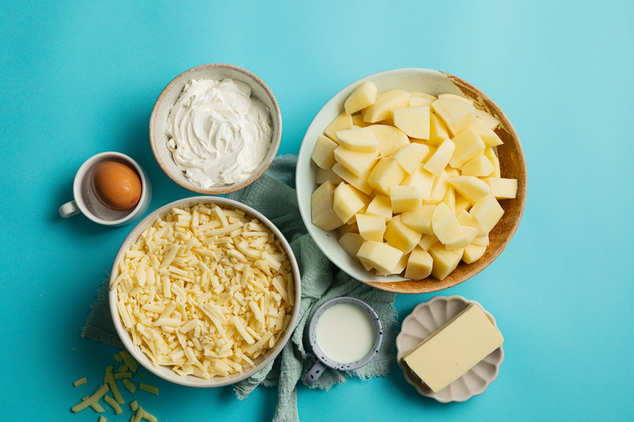 Easy Twice-Baked Mashed Potatoes Recipe Overhead View of The Ingredients Separated into Small Bowls