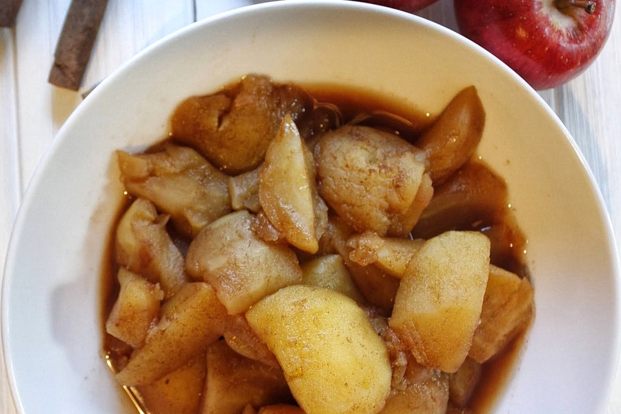 Faster than Stovetop Instant Pot Cinnamon Apples Recipe Close Up of a White Bowl of Cinnamon Apples