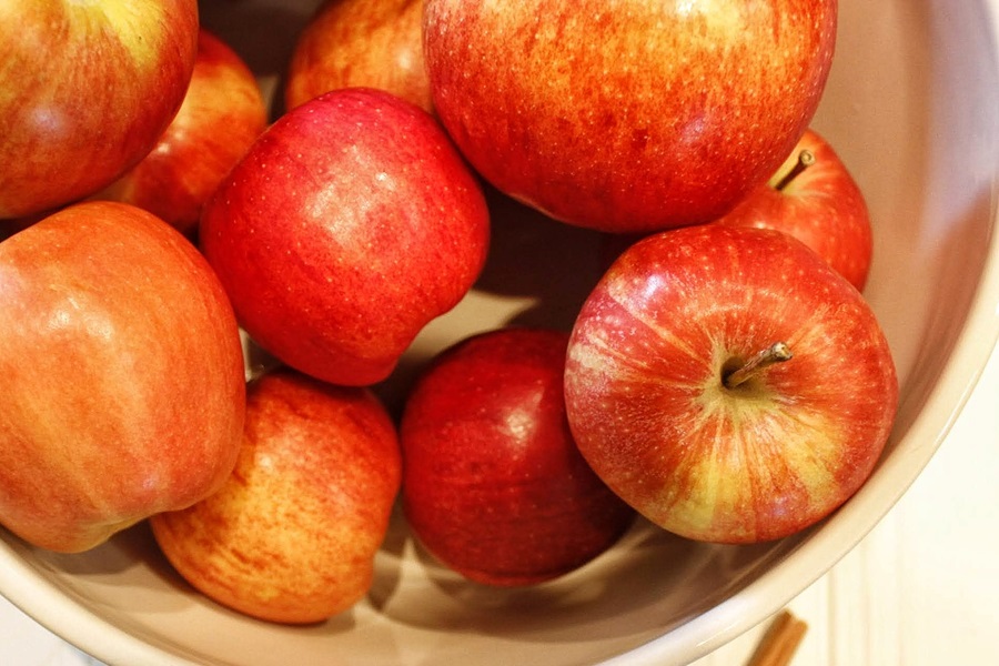 Faster than Stovetop Instant Pot Cinnamon Apples Recipe a Bowl of Red Apples