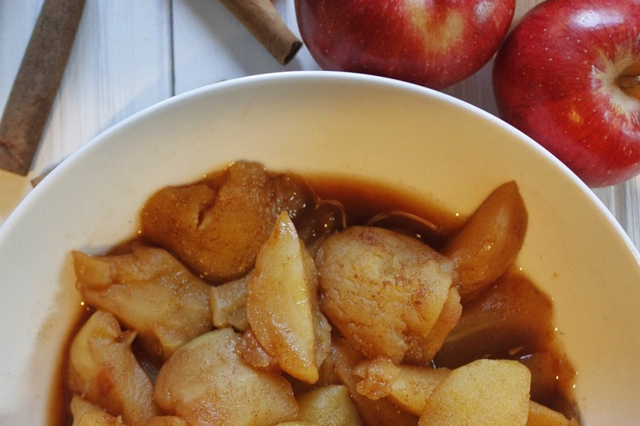 Faster than Stovetop Instant Pot Cinnamon Apples Recipe Close Up of a White Bowl Filled with Cinnamon Apples