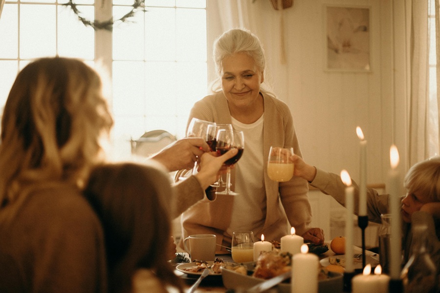 Southern Thanksgiving Recipes a Family Enjoying Thanksgiving Dinner Together with a Toast