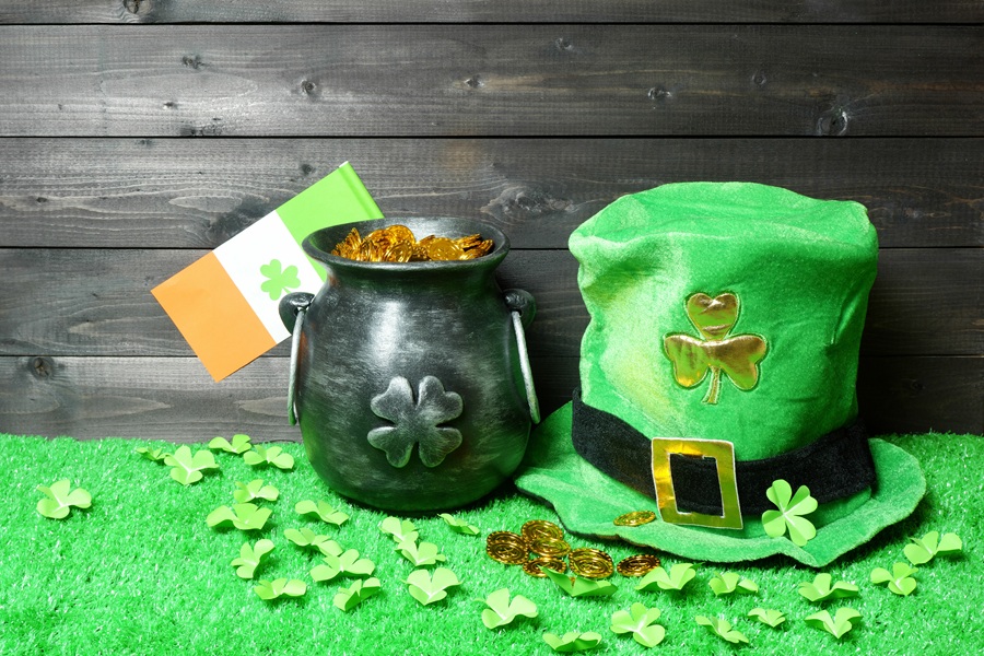 St Patricks Day Cupcake Recipes a Cast Iron Pot of Gold Next to a Felt Leprechaun Hat on a Green Table