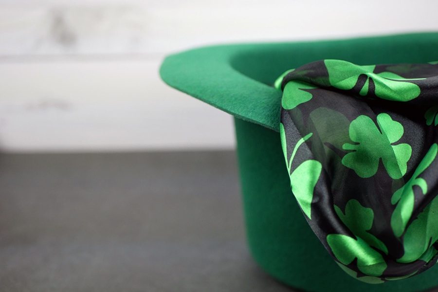 St Patricks Day Cupcake Recipes a Leprechaun Hat with a  Black and Green Scarf Coming From it