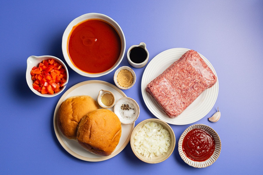 Crockpot Sloppy Joes Recipe Ingredients Separated Onto Plates